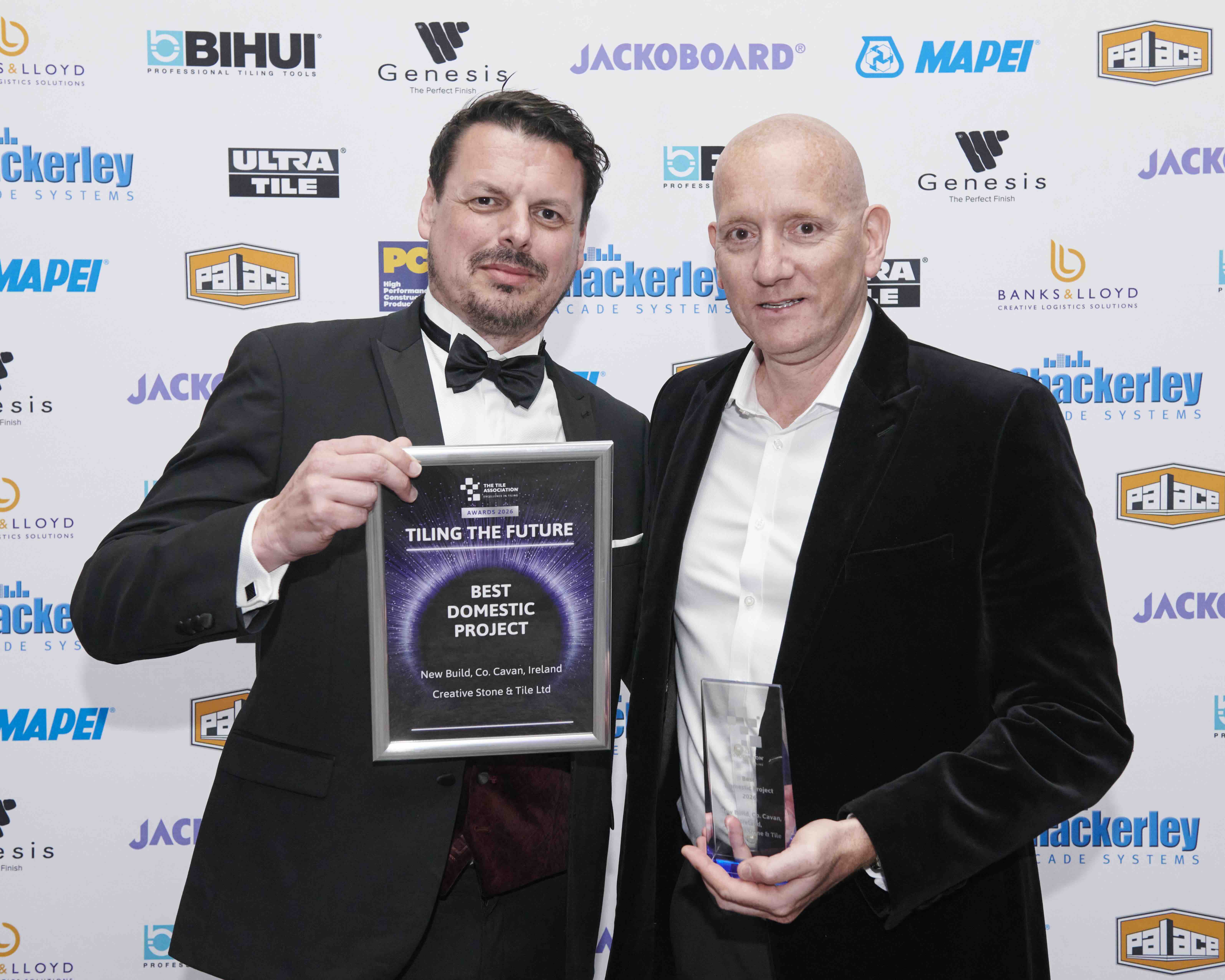TTA Awards 2026 Best Domestic Project L to R Michael Gadney Marc Poland on behalf of Creative Stone and Tile Ltd HIP3812
