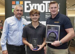 TTA Awards 2026 Trainee Tile Fixer of the Year L to R Paul Luff Luca Dennis NoMorePly Presenter HIP3171