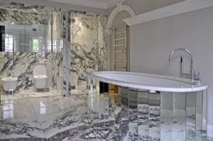 white marble tiles modern bathroom mirrored tile bathtub image no people photograph photography long smart well organised colour wealth